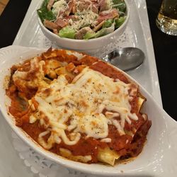 Bras d'Or Lakes Inn - Stuffed Cannelloni And classic Caesar salad with Smokey bacon, croutons, and home made creamy dressing  -so tasty!!