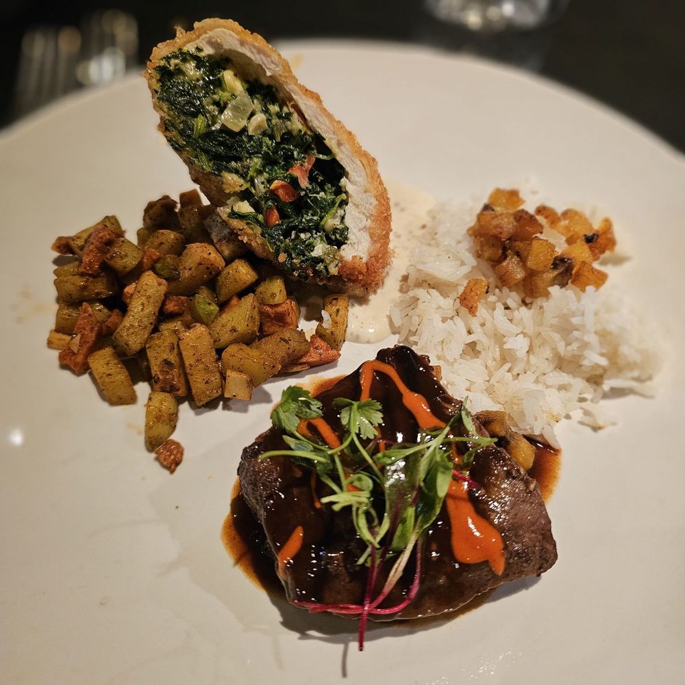 Luna Modern Mexican Kitchen - Spinach stuffed breaded chicken and beef filet combo. - Mexican Near Me - Corona, California Luna Modern Mexican Kitchen - Spinach stuffed breaded chicken and beef filet combo. - Mexican Near Me - Corona, California