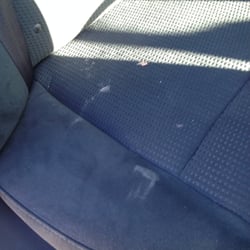 Dollar Car Rental - Something nasty smeared on the back seat.