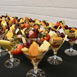 The cheese and charcuterie ensemble in martini glasses. Amazing selection of everything on thr glass. The cheese and charcuterie ensemble in martini glasses. Amazing selection of everything on thr glass.