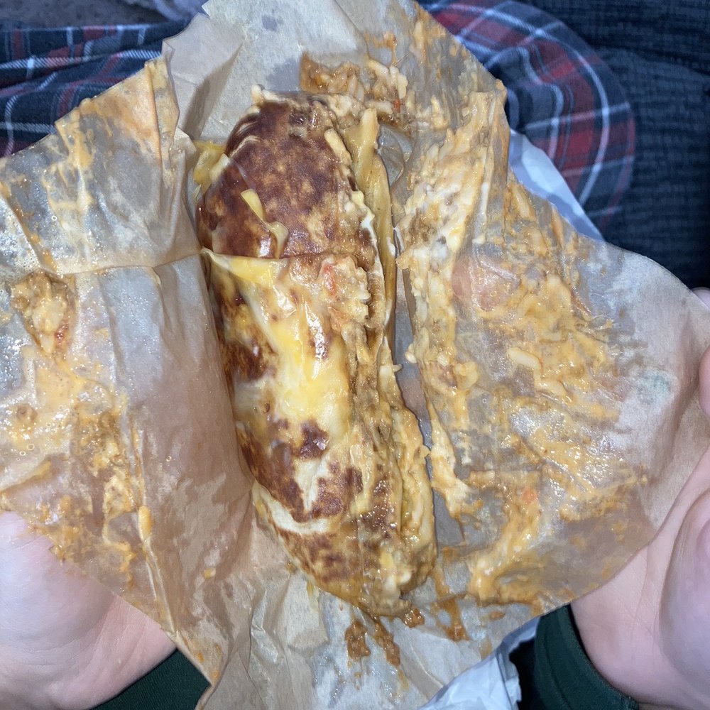 Taco Bell - Grilled Cheese Burrito, squished before it even left the restaurant. - Fast Food Near Me - Charlotte, North Carolina Taco Bell - Grilled Cheese Burrito, squished before it even left the restaurant. - Fast Food Near Me - Charlotte, North Carolina