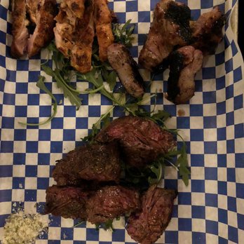 Ciudad - Chicken (top left), Pork (top right), and Steak (bottom) - Tapas/Small Plates Near Me - Seattle, Washington Ciudad - Chicken (top left), Pork (top right), and Steak (bottom) - Tapas/Small Plates Near Me - Seattle, Washington