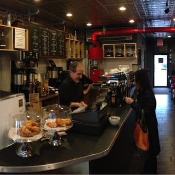 The Coffee Mill Roasters - Cool tin ceiling, brick and tile walls. So European ! - Coffee & Tea Near Me - Millburn, New Jersey The Coffee Mill Roasters - Cool tin ceiling, brick and tile walls. So European ! - Coffee & Tea Near Me - Millburn, New Jersey
