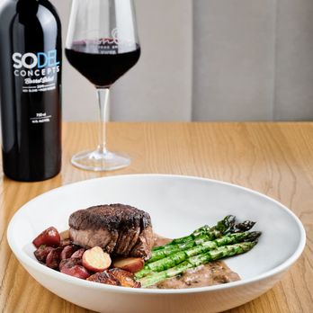 Fish On - a plate of food and a glass of wine - Seafood Near Me - Lewes, Delaware