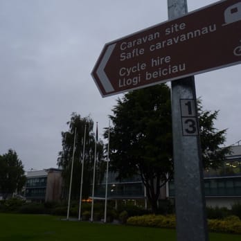 Sophia Gardens - A sign pointing to other places right by Sophia Gardens - Parks Near Me - Cardiff, CRF Sophia Gardens - A sign pointing to other places right by Sophia Gardens - Parks Near Me - Cardiff, CRF