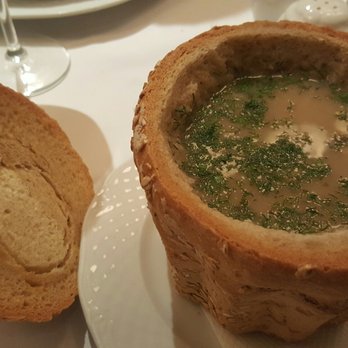 Kogel Mogel - Rabbit soup with quail egg served in a bread bowl. - Polish Near Me - Kraków, Massachusetts Kogel Mogel - Rabbit soup with quail egg served in a bread bowl. - Polish Near Me - Kraków, Massachusetts