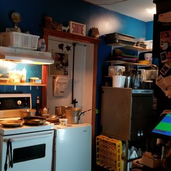 Kraken Cru - a man standing in a kitchen - Seafood Near Me - Quebec City, Quebec Kraken Cru - a man standing in a kitchen - Seafood Near Me - Quebec City, Quebec