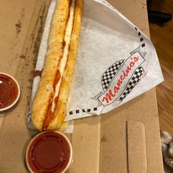 Mancino's Pizza And Grinders - Loaded bread logs w/ red sauce