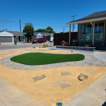 Izazaga Landscape - an artificial grass area in front of a house - Landscaping Near Me