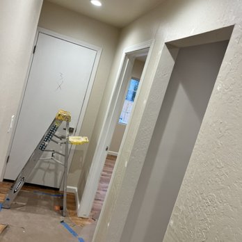 Soriano Painting - This is the hallway we were working at finishing painting the wall and ceiling - Painters Near Me Soriano Painting - This is the hallway we were working at finishing painting the wall and ceiling - Painters Near Me