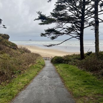 Hug Point State Recreation Site - The path walking down to hug point from the parking lot. There's a few stairs at the bottom and then rocks to walk over - Parks Near Me - Arch Cape, Oregon Hug Point State Recreation Site - The path walking down to hug point from the parking lot. There's a few stairs at the bottom and then rocks to walk over - Parks Near Me - Arch Cape, Oregon