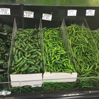 Patel Brothers - a display of peppers in a grocery store - International Grocery Near Me - Cary, North Carolina Patel Brothers - a display of peppers in a grocery store - International Grocery Near Me - Cary, North Carolina