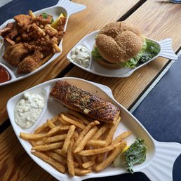 Blackened salmon, cod burger, and combination platter Blackened salmon, cod burger, and combination platter