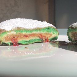 Swamp Snacks - A strawberry Uncrustables peanut butter and jelly sandwich dipped in our homemade Swamp Batter, topped with powdered sugar
