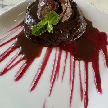 Pure Food and Juice - Melt In Your Mouth Brownie - Warm brownie, chocolate frosting, raspberry & chocolate drizzle. - Juice Bars & Smoothies Near Me - Tulsa, Oklahoma
