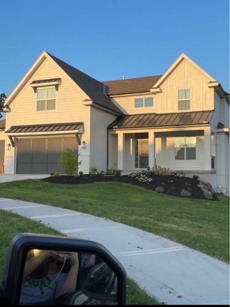 Slide of Archie's Roofing & Construction