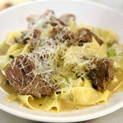 Bodega Bar & Grill - Garlic, Rosemary, Sautéed with Short Ribs and Portobello Mushrooms in a Port Red Wine Sauce tossed in a Pappardelle Pasta