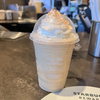 Starbucks - a cup of coffee with whipped cream on top - Coffee & Tea Near Me - Enfield, Connecticut