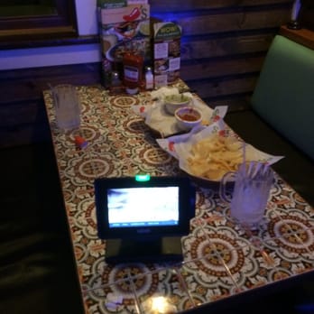 Chili's - Our table after the meal. The little touch screen machine calculates your bill and you can pay on it without bothering the staff - American Near Me - Niagara Falls, New York Chili's - Our table after the meal. The little touch screen machine calculates your bill and you can pay on it without bothering the staff - American Near Me - Niagara Falls, New York