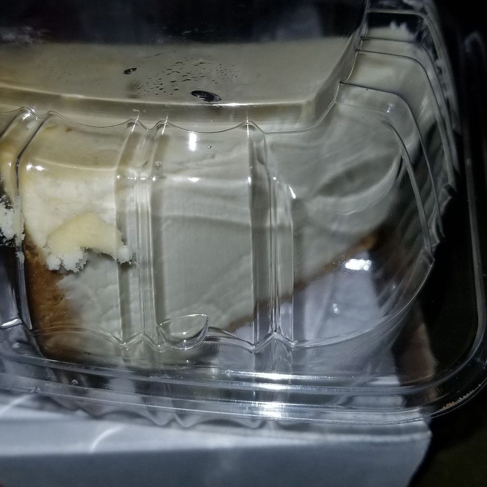 Farmer's Pizza - a slice of cheesecake in a plastic container - Pizza Near Me - St. Albans, New York