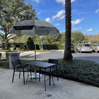 Patticakes - a table and chairs on a sidewalk - Coffee & Tea Near Me - Newberry, Florida Patticakes - a table and chairs on a sidewalk - Coffee & Tea Near Me - Newberry, Florida