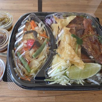 CoCoCurry - Krispy duck over rice with papaya salad. Curry sauce is packaged separately for take out orders so it doesn't get soggy. - Thai Near Me - San Diego, California CoCoCurry - Krispy duck over rice with papaya salad. Curry sauce is packaged separately for take out orders so it doesn't get soggy. - Thai Near Me - San Diego, California