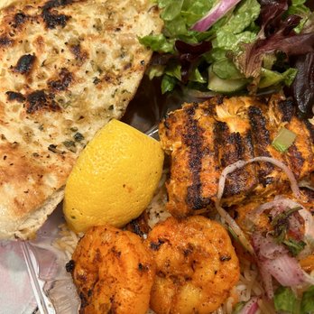 Maiwand Grill - Salmon & Shrimp Kabob Combo with Tandoori Garlic Naan - Afghan Near Me - Baltimore, Maryland Maiwand Grill - Salmon & Shrimp Kabob Combo with Tandoori Garlic Naan - Afghan Near Me - Baltimore, Maryland