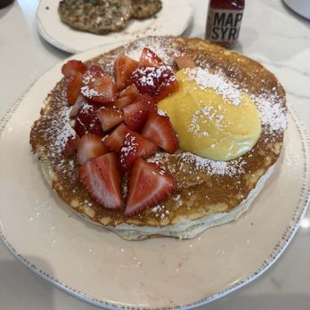 First Watch - Lemon Ricotta Pancakes with Maple Syrup, and a side of chicken sausage. - Breakfast & Brunch Near Me - Las Vegas, Nevada First Watch - Lemon Ricotta Pancakes with Maple Syrup, and a side of chicken sausage. - Breakfast & Brunch Near Me - Las Vegas, Nevada