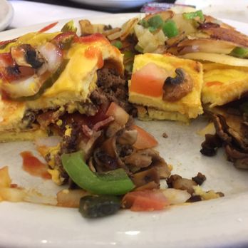 Sam & Charlie's White Hut Diner - Inside bacon cheese burger omelet (left) - Breakfast & Brunch Near Me - Toledo, Ohio Sam & Charlie's White Hut Diner - Inside bacon cheese burger omelet (left) - Breakfast & Brunch Near Me - Toledo, Ohio