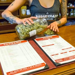 Photo of Barbary Coast  Dispensary - San Francisco, CA, US. Budtenders present and weigh medical cannabis in front of our patients.