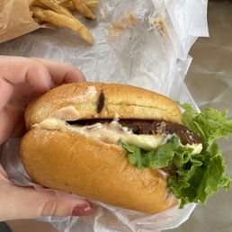 Junior burger with pepper jack, lettuce, tomato, onions