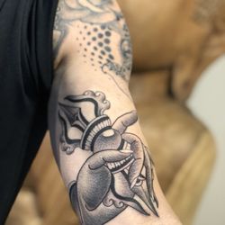 Rite of Passage - Vajra on bicep.