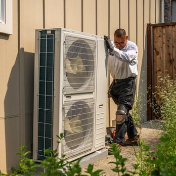 Elevated Comfort - Setting a Heat Pump outdoor unit during Install. - Heating & Air Conditioning/HVAC Near Me - Cotati, California Elevated Comfort - Setting a Heat Pump outdoor unit during Install. - Heating & Air Conditioning/HVAC Near Me - Cotati, California