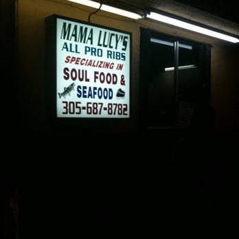 Mama Lucy's Homestyle Cooking - Outside pickup window on right (facing 22nd Avenue). - Barbeque Near Me - Miami, Florida