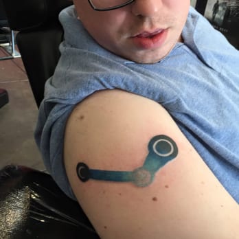 Atomic Tattoos - Steam logo looks amaze balls! Thank you so much, Erin! - Piercing Near Me - Tampa, Florida
