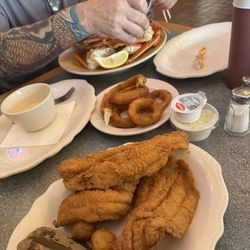 Captain John's Dockside - Filet of Catfish Beer Battered Onion Rings and crab legs