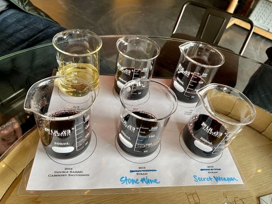 Photo of Barrage Cellars - Woodinville, WA, US. The chemist in me loves the use of beakers for the tastings!