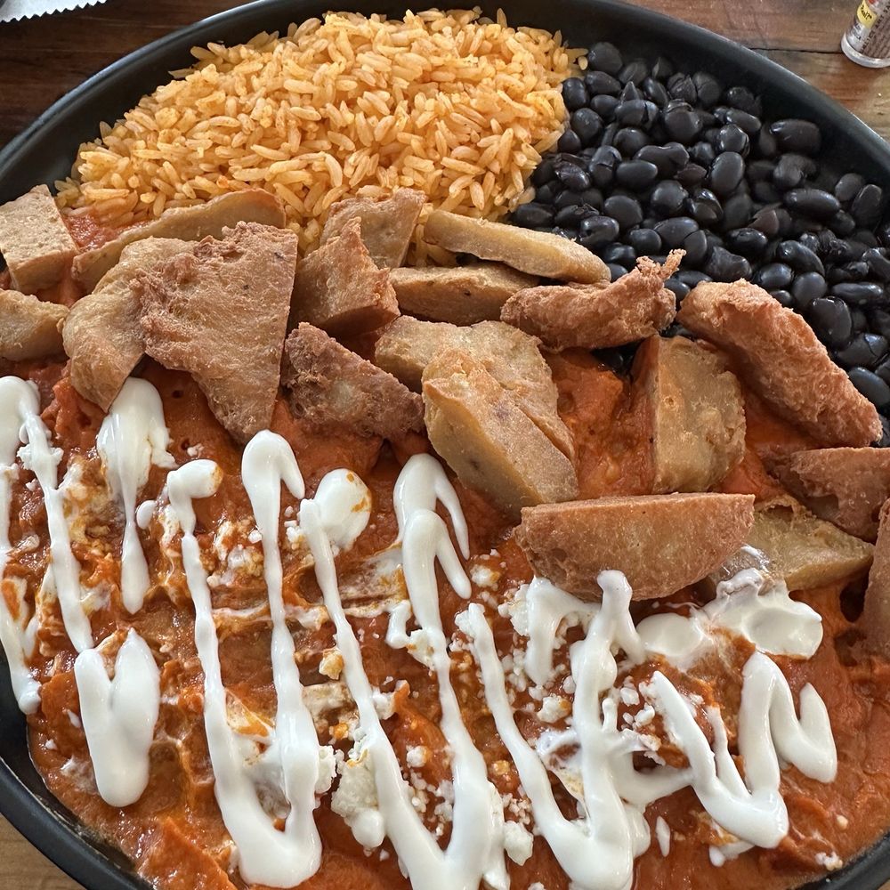 CHILAQUILES RED with vegan fried chicken CHILAQUILES RED with vegan fried chicken