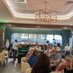 Palm City Social - Open kitchen at rear of room