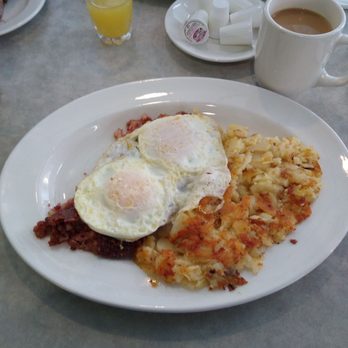 Halfmoon Diner - Not a bad looking breakfast.  Two eggs over easy home fries and corn beef hash and rye bread. - Diners Near Me - Clifton Park, New York