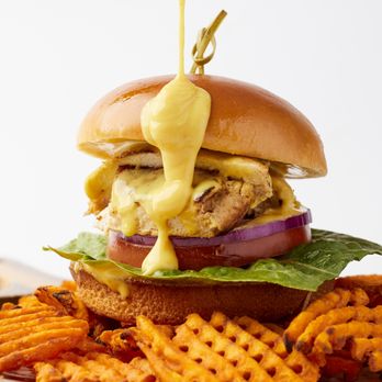 Sproutz - Doral - Honey Mustard Chicken burger with baked sweet potato fries - Salad Near Me - Doral, Florida Sproutz - Doral - Honey Mustard Chicken burger with baked sweet potato fries - Salad Near Me - Doral, Florida