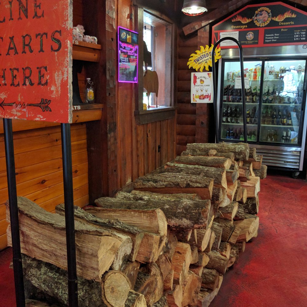 Colt's Pig Stand - Real wood, a nice decorative touch - Barbeque Near Me - Ormond Beach, Florida