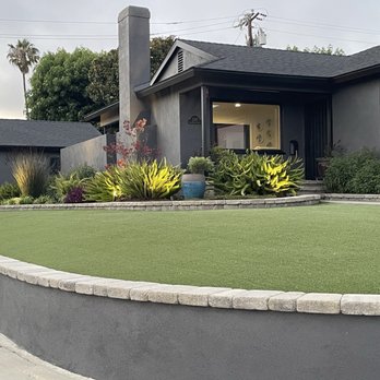 Pine Tree Design & Construction - Front yard garden beds illuminated with new exterior paint, lighting & stuccoed retaining wall. - General Contractors Near Me - Woodland Hills, California Pine Tree Design & Construction - Front yard garden beds illuminated with new exterior paint, lighting & stuccoed retaining wall. - General Contractors Near Me - Woodland Hills, California