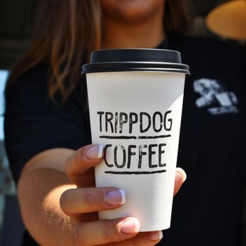 Tripp Dog Coffee - a woman holding a cup of coffee - Coffee & Tea Near Me - Salem, Oregon Tripp Dog Coffee - a woman holding a cup of coffee - Coffee & Tea Near Me - Salem, Oregon