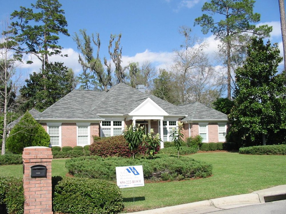 Slide of Total Quality Roofing