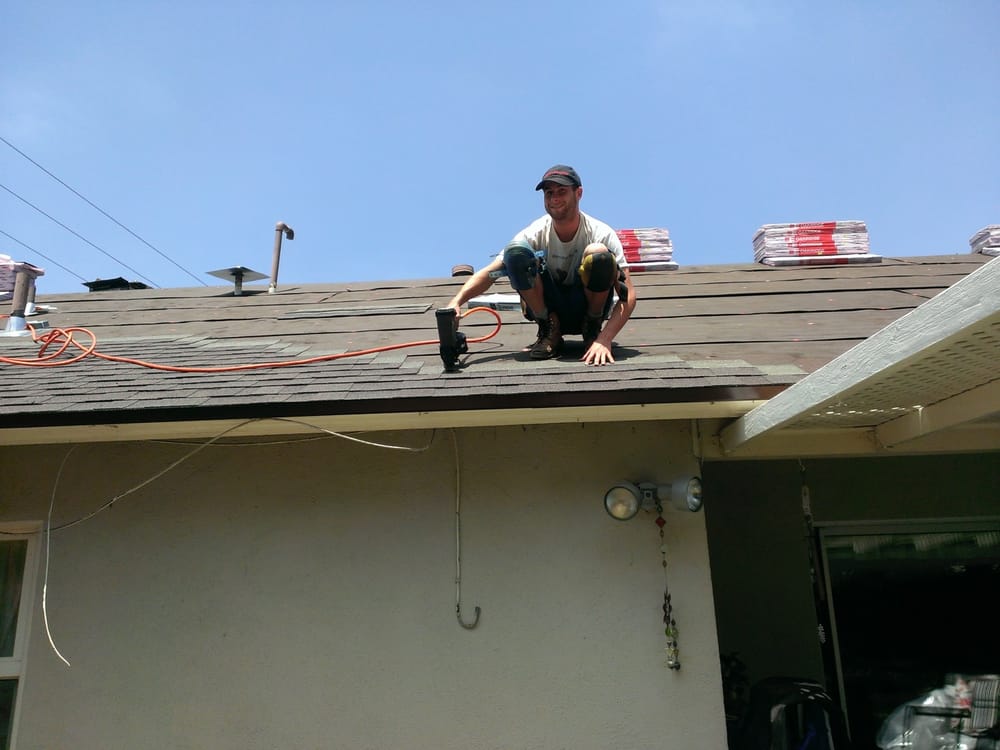 Slide of Kenney Roofing