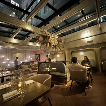 Le Basque - Second floor dining with a huge skylight. - Vegan Near Me - New York, New York