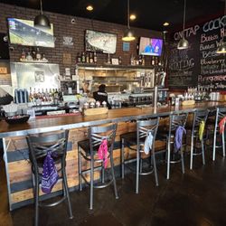 Bubba’s Bones & Brews - Bar seating, as well as indoor and patio dining areas.