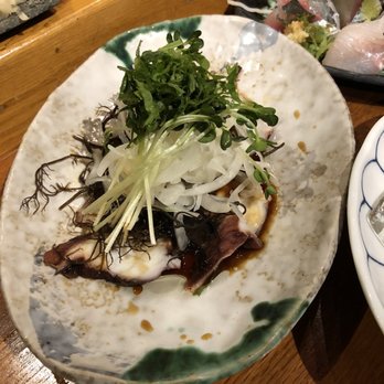 Imanas Tei - Tako marine which has radish sprouts, green Chios, sliced onion, ogo and capers with special vinaigrette dressing. - Sushi Bars Near Me - Honolulu, Hawaii
