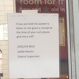 sign on krystal saying to call the manager if there's an issue with the system or a receipt sign on krystal saying to call the manager if there's an issue with the system or a receipt